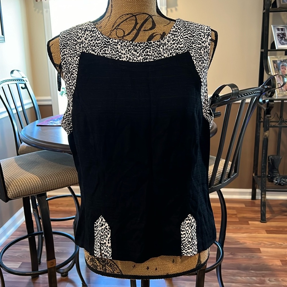 Size 14 black with w&b leopard print trim and a button up back top